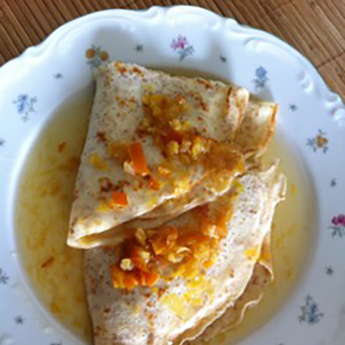 Flensjes in sinaasappelsaus